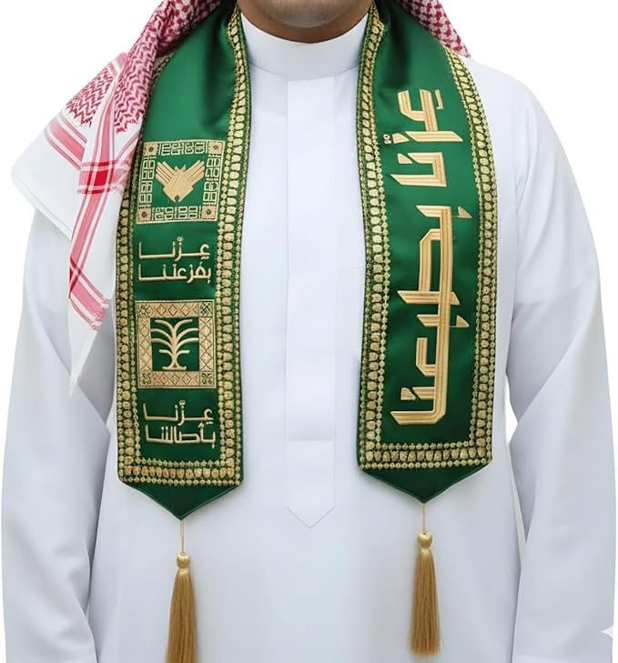 audi National Day 95 | Emerald Green Satin with Luxurious Gold Embroidery عزّنا بطبعنا | Arabic Calligraphy, Palm Tree & Swords Emblem | Elegant Tassels & Heritage Scarf & Cultural Celebrations